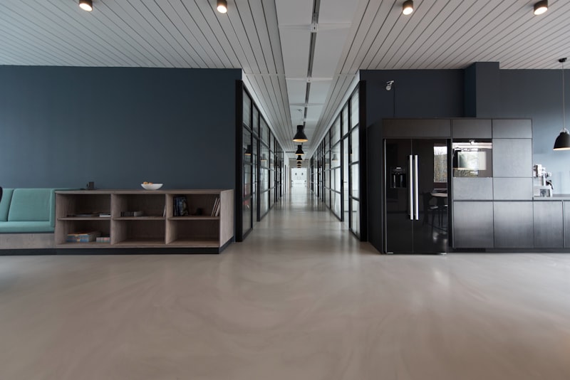 generate an image of a sleek corporate boardroom with panoramic city views, modern furniture, moody lighting, luxury office design